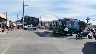 A Woman Was Hit By A Bus While Crossing The Road