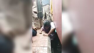 A Woman Squeezed Between The Platform And The Train. India "