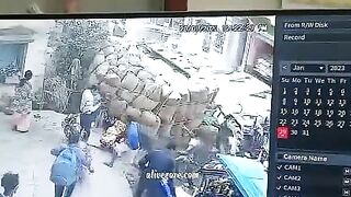 An Overturned Trailer Containing Cement Buries Several People