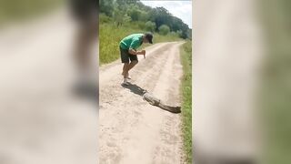Animal Abuser Tries To Stab Crocodile