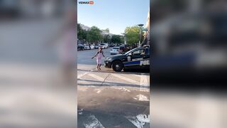 Baltimore Police Watch Woman Cleaning Car -