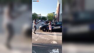 Baltimore Police Watch Woman Cleaning Car -