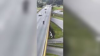 Box Truck Pushes Cyclist Off Overpass