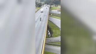 Box Truck Pushes Cyclist Off Overpass