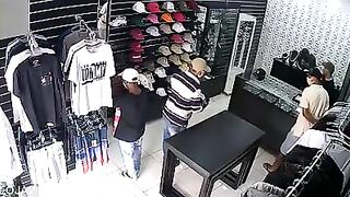 Clothing Store Owner Kills Three Suspects