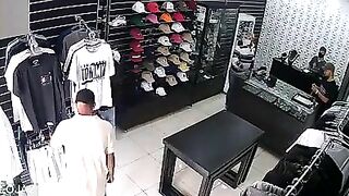 Clothing Store Owner Kills Three Suspects