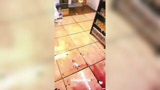 Crazy Woman Punching Bottles In Store 