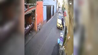 Driver Unconscious, Runs Over Woman On Narrow Street