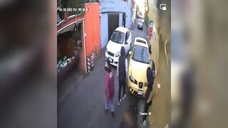 Driver Unconscious, Runs Over Woman On Narrow Street