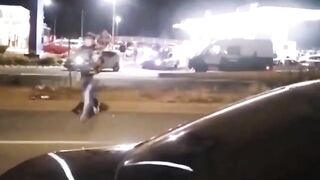 A Pregnant Man Crosses The Road Carrying A Case Of Beer