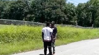 A Man Wearing A BLM T-shirt Grabs Another