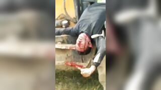 Horrible Death As Man On Tractor Tortured Shot 