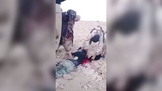 ISIS Terrorists Chop Off A Prisoner's Arm, Then His Head 