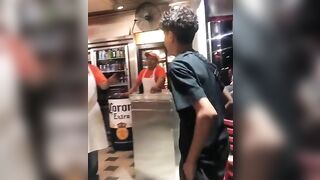 A Kid Tries To Attack A Man In A Pizza Place