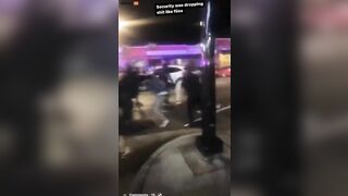 A Large Group Of Security Guards Surround And Arrest Unruly Nightclub Members