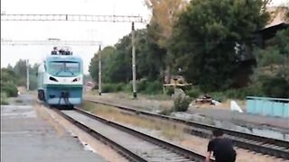 Madman Lying In Front Of Oncoming Train