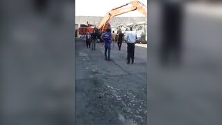 Man Destroys 5 Trucks With Excavator After Uncle Refuses
