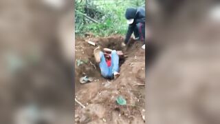 Man Digs His Own Grave