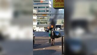 Man Appears To Have Set Fire To His Car In The Middle Of It