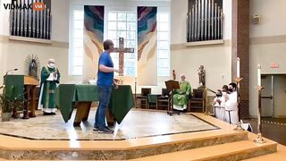 Man Storms Altar As Parishioners Pile On Altar With Dogs During Mass