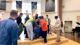 Man Storms Altar As Parishioners Pile On Altar With Dogs During Mass