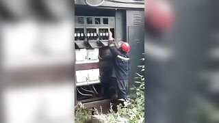 Person Trying To Repair Electrical System