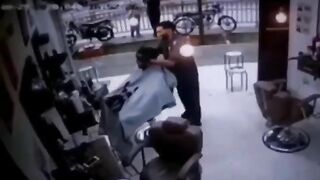 Man Hit While Cutting Hair