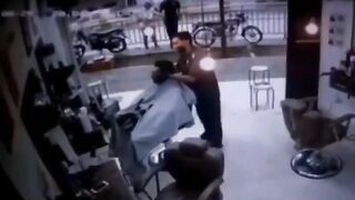 Man Hit While Cutting Hair