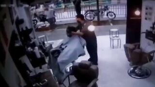 Man Hit While Cutting Hair