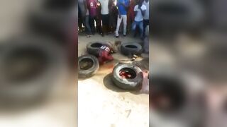 Angry Mob Throws Stones At Thief