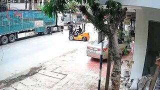 Motorcyclist Falls Headfirst Into Forklift 