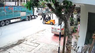 Motorcyclist Falls Headfirst Into Forklift 