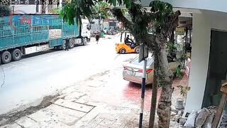 Motorcyclist Falls Headfirst Into Forklift 