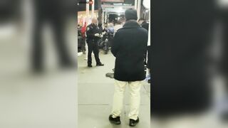 NYPD Officer Arrests Homeless Man B