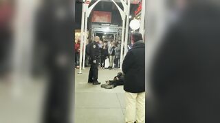 NYPD Officer Arrests Homeless Man B