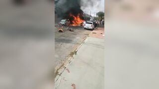 Aftermath Of Plane Crash In Residential Street