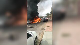 Aftermath Of Plane Crash In Residential Street