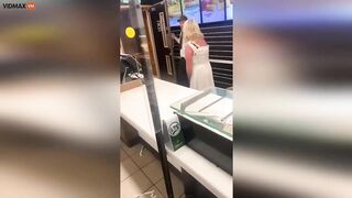 Strange Woman Walks Behind The Counter Of McDonald's And Star