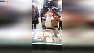 Strange Woman Walks Behind The Counter Of McDonald's And Star