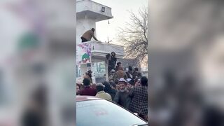 Taliban Hangs Hashim's Body On Building For Public Display