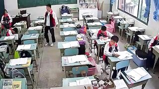 Teacher Hit On The Head With Hammer