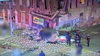 The Suspect's Car Crashed Into The Building, Causing It To Fall Downwards