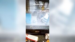 Tire Hits Worker 