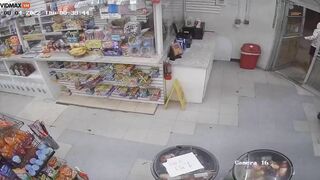 Thug Hits Shop Owner With Baseball Bat During Robbery