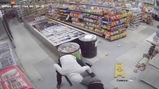 Thug Hits Shop Owner With Baseball Bat During Robbery