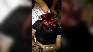 Failed Attempt To Behead A Tied Man 