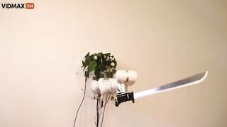 Watch A Plant Control A Machete-wielding Robotic Arm