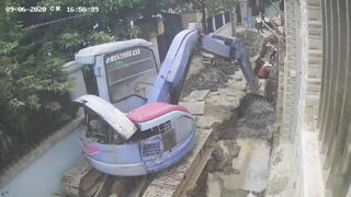 The Wall Collapsed After The Excavator Started, Injuring A Worker