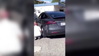 Watch A Couple Try Filling Their Tesla Tires With Propa