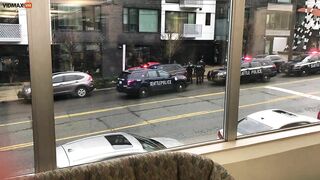 Watch Seattle Police Officer Flee In Car With Gun Drawn